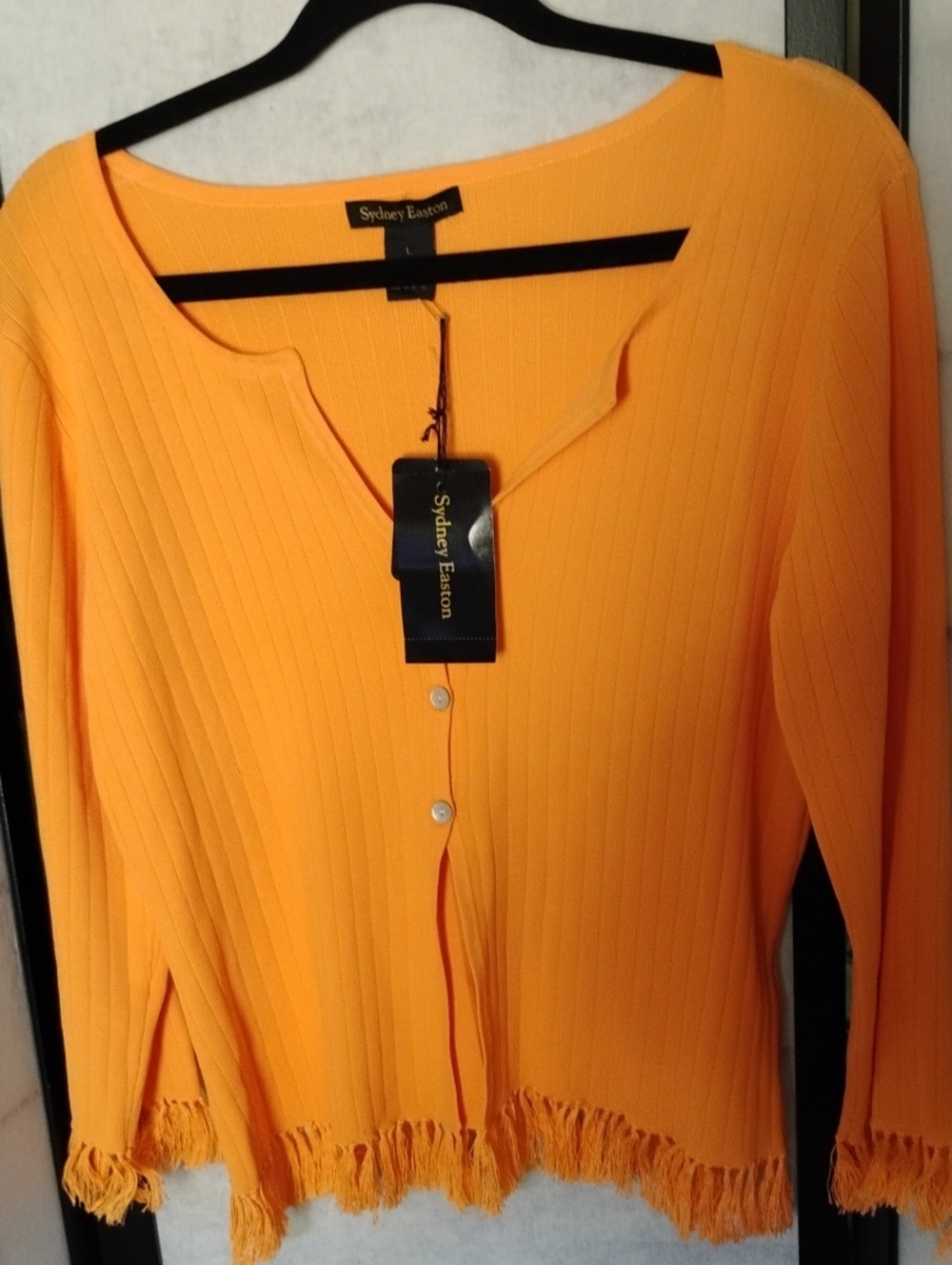 Sydney Easton- Beautiful Cantaloupe Cute Top With Fringe Bottom And Sleeves